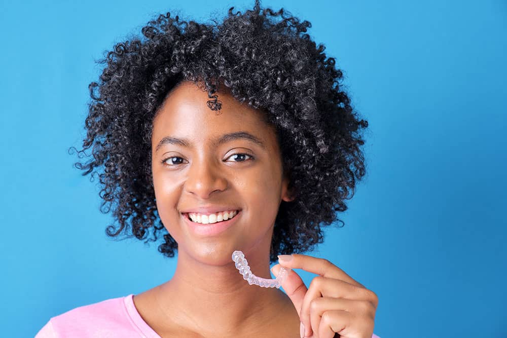 Woman wearing Invisalign